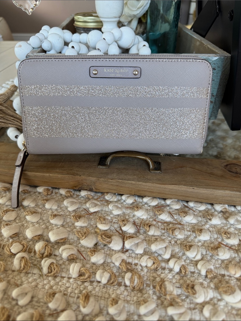 kate spade glitter stripe zip-around wallet in light beige and metallic